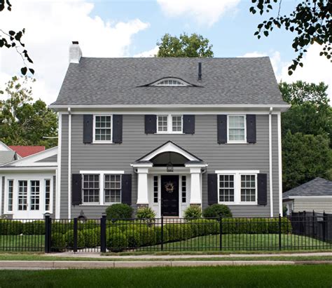 light gray house with dark gray shutters
